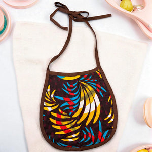Babero para bebé con estampado africano - Plumas Multicolor (Unisex)