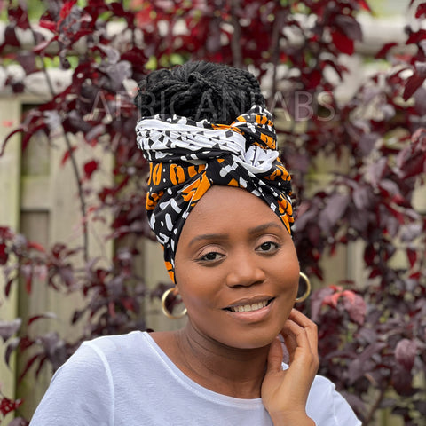 Negro africano / naranja bogolan / turbante de tela de barro