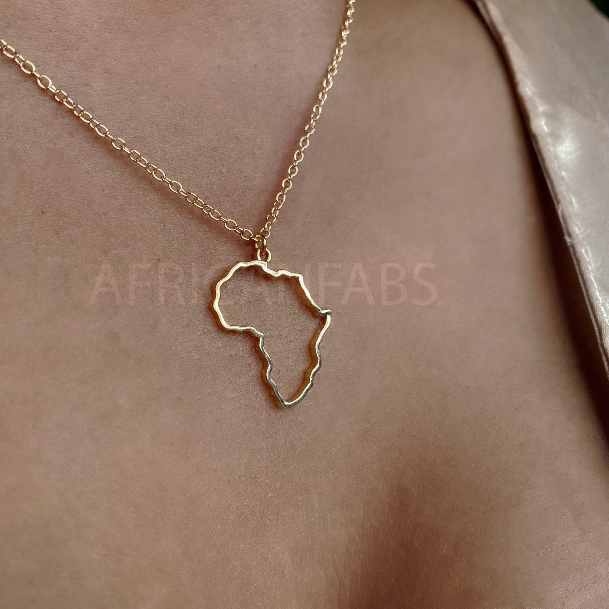 Collar / colgante - Continente Africano - Oro